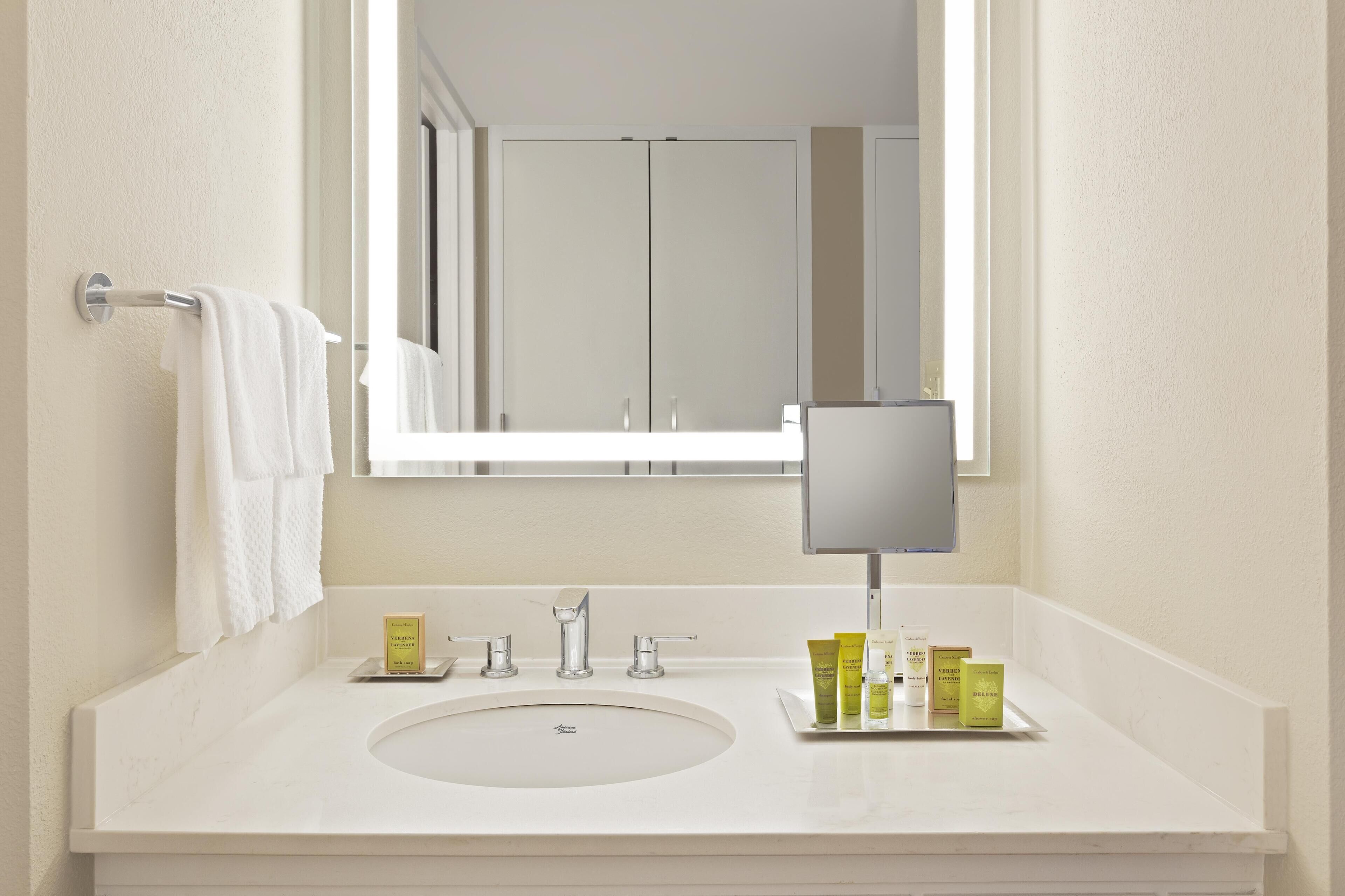 Combined shower/tub, designer toiletries, hair dryer, bathrobes