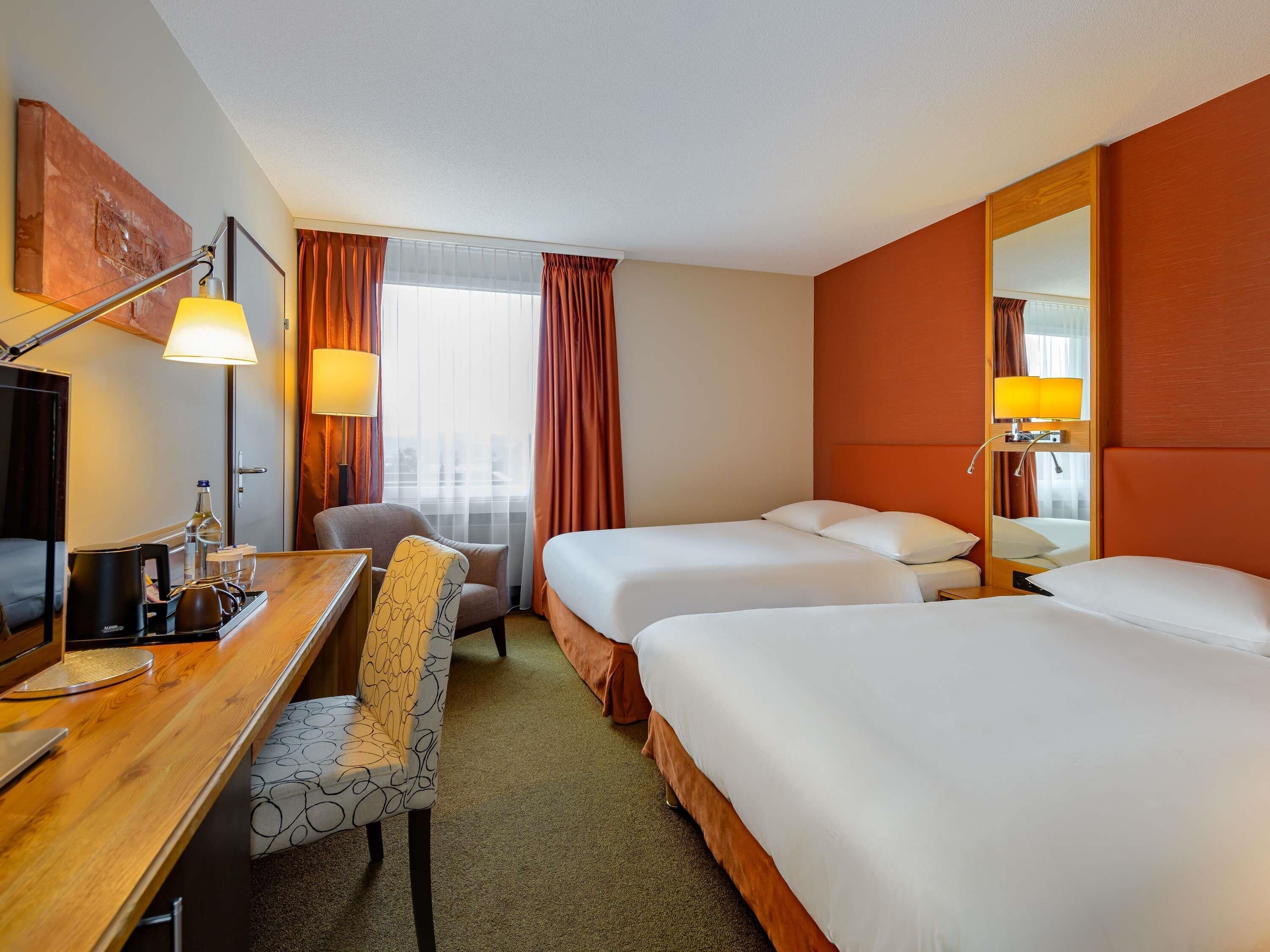 Hypoallergeen beddengoed, een minibar, een kluis op de kamer, een bureau