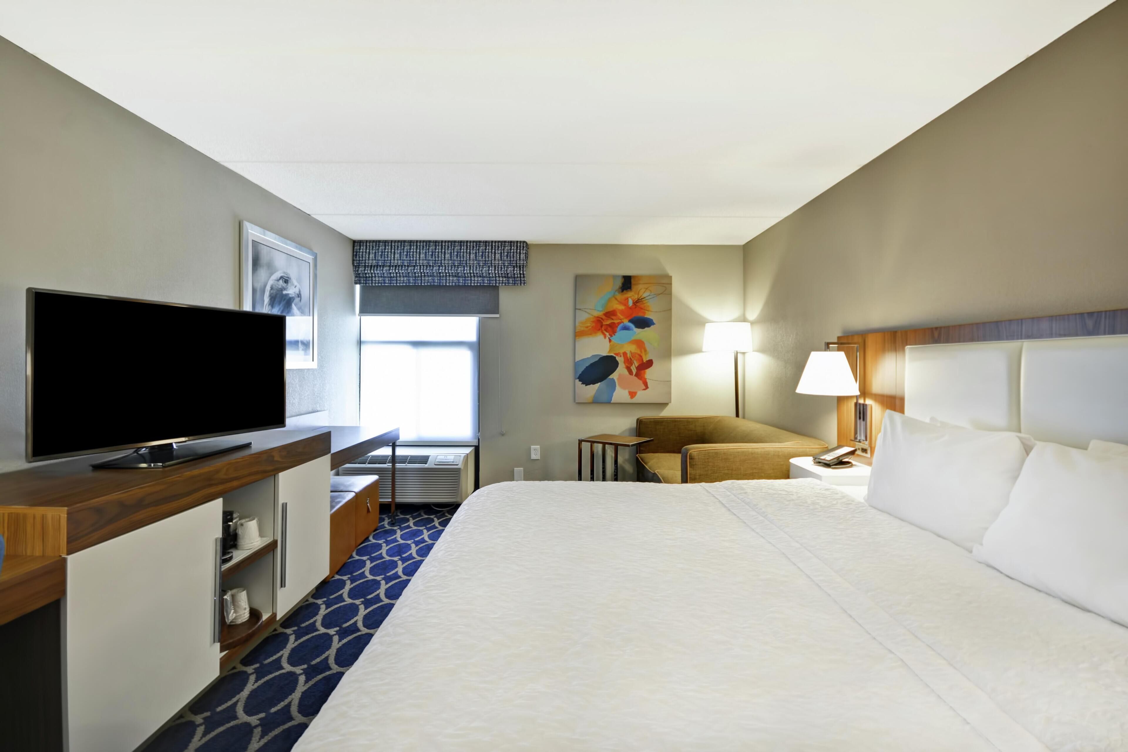 Premium bedding, desk, blackout curtains, iron/ironing board