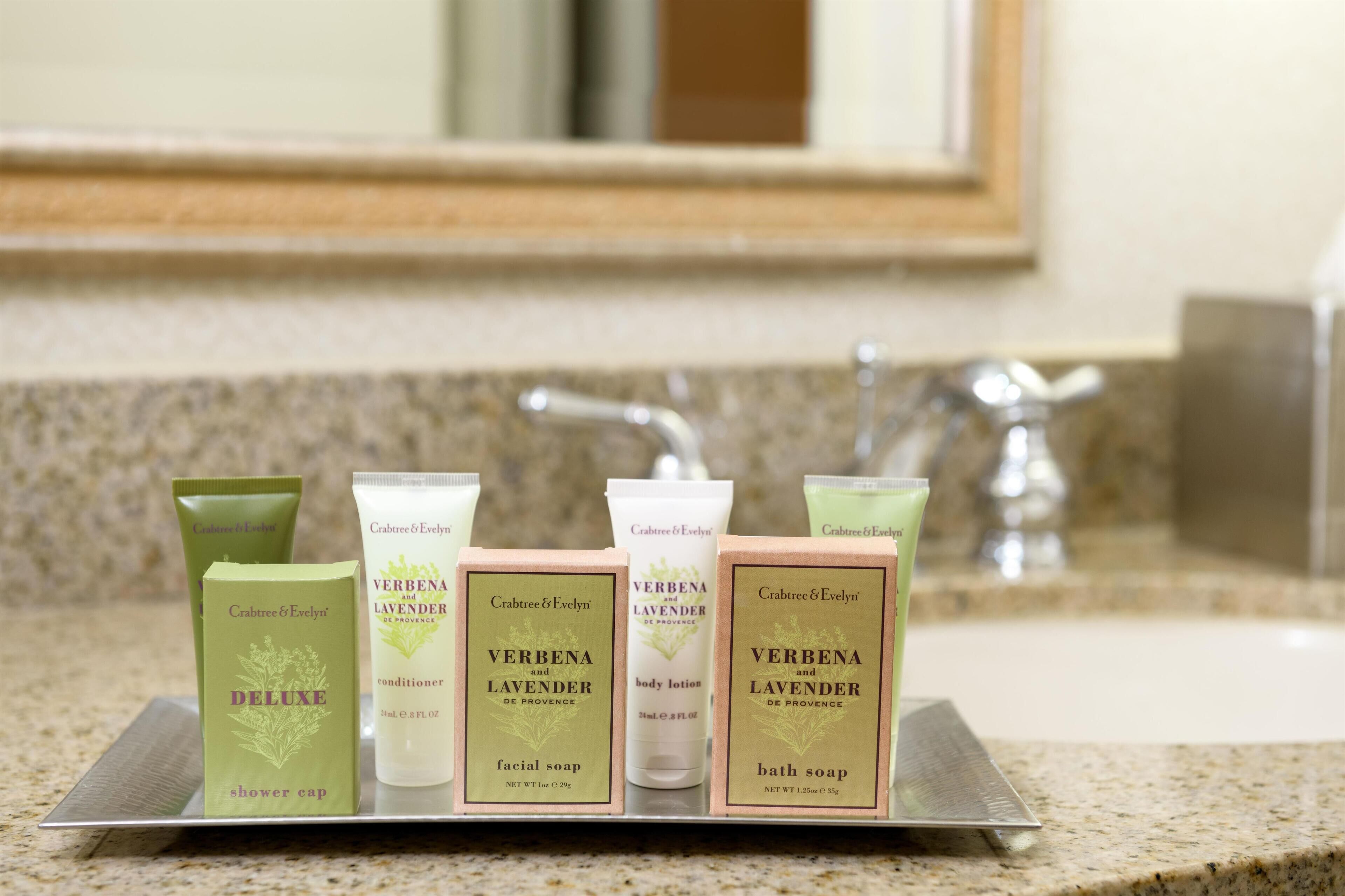 Combined shower/bathtub, designer toiletries, hair dryer, towels