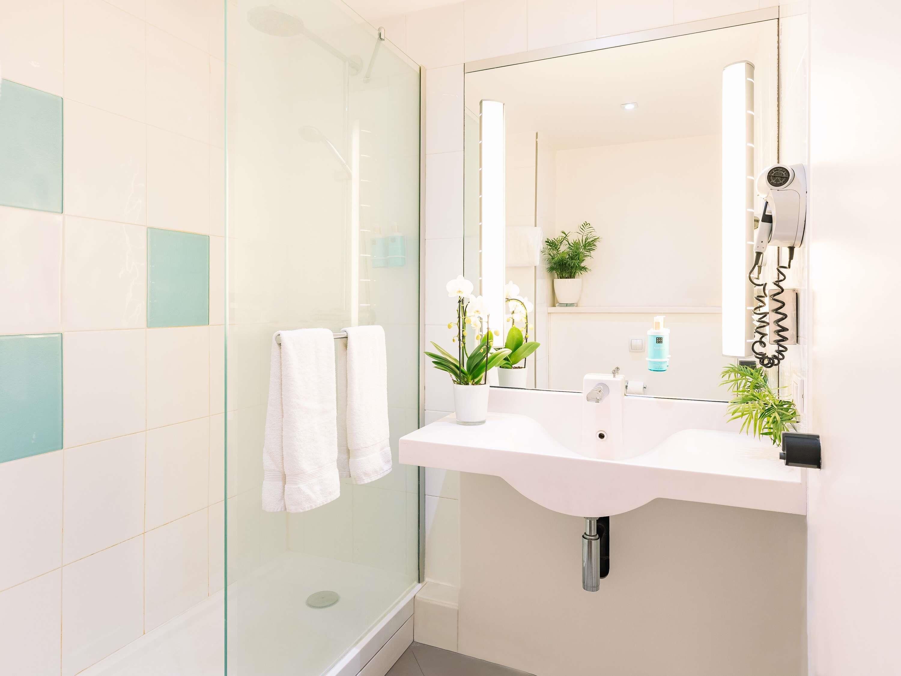 Hypo-allergenic bedding, down comforters, minibar, in-room safe