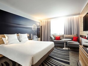 Hypo-allergenic bedding, down comforters, minibar, in-room safe