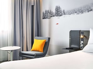 Hypo-allergenic bedding, down comforters, minibar, in-room safe