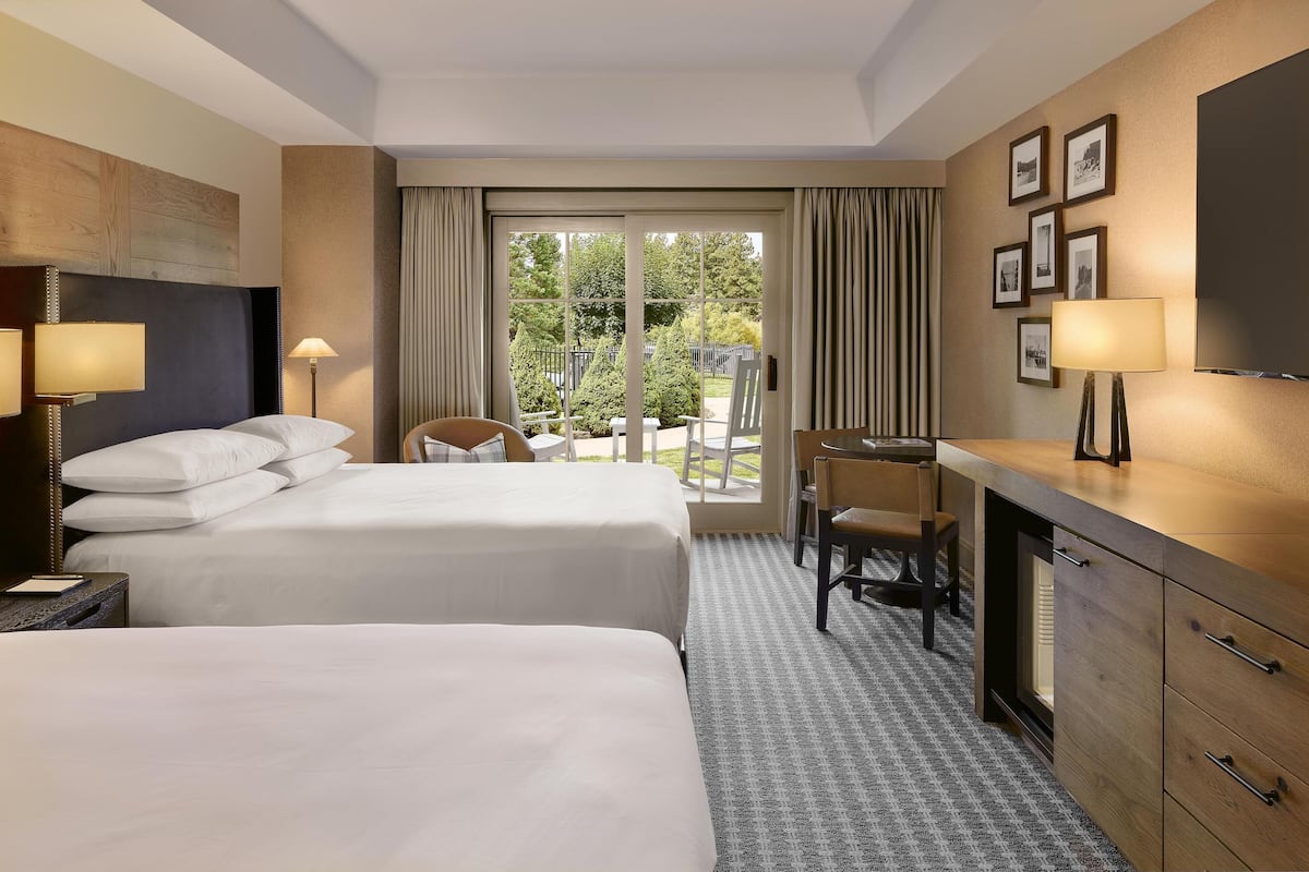 Room, 2 Queen Beds, Patio, Pool View | Down comforters, pillowtop beds, in-room safe, desk