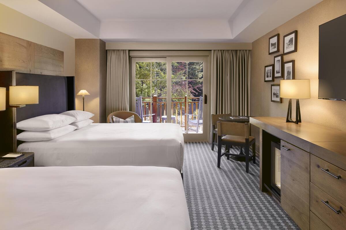 Down duvets, pillow-top beds, in-room safe, desk