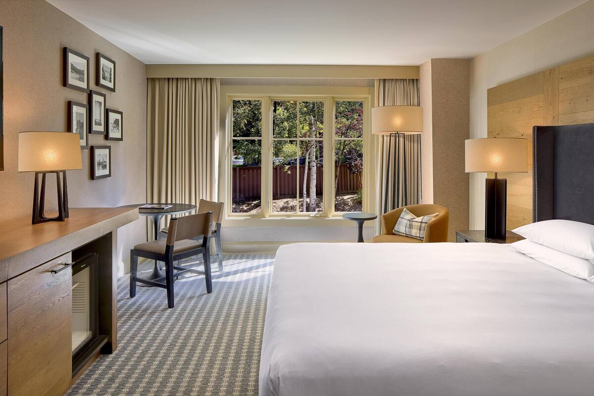 Down duvets, pillow-top beds, in-room safe, desk