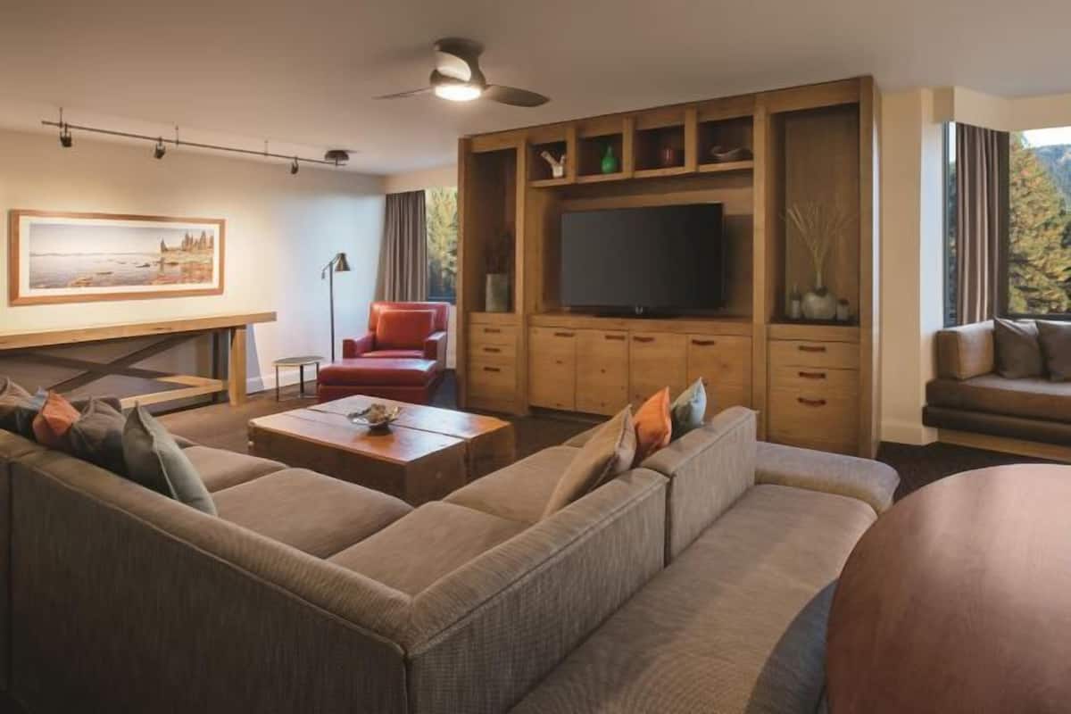 Living area | 65-inch flat-screen TV with cable channels, TV, pay films