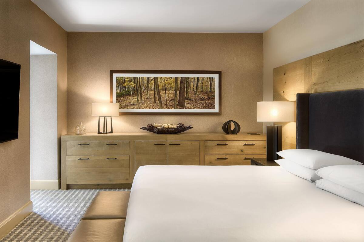 Down duvets, pillow-top beds, in-room safe, desk