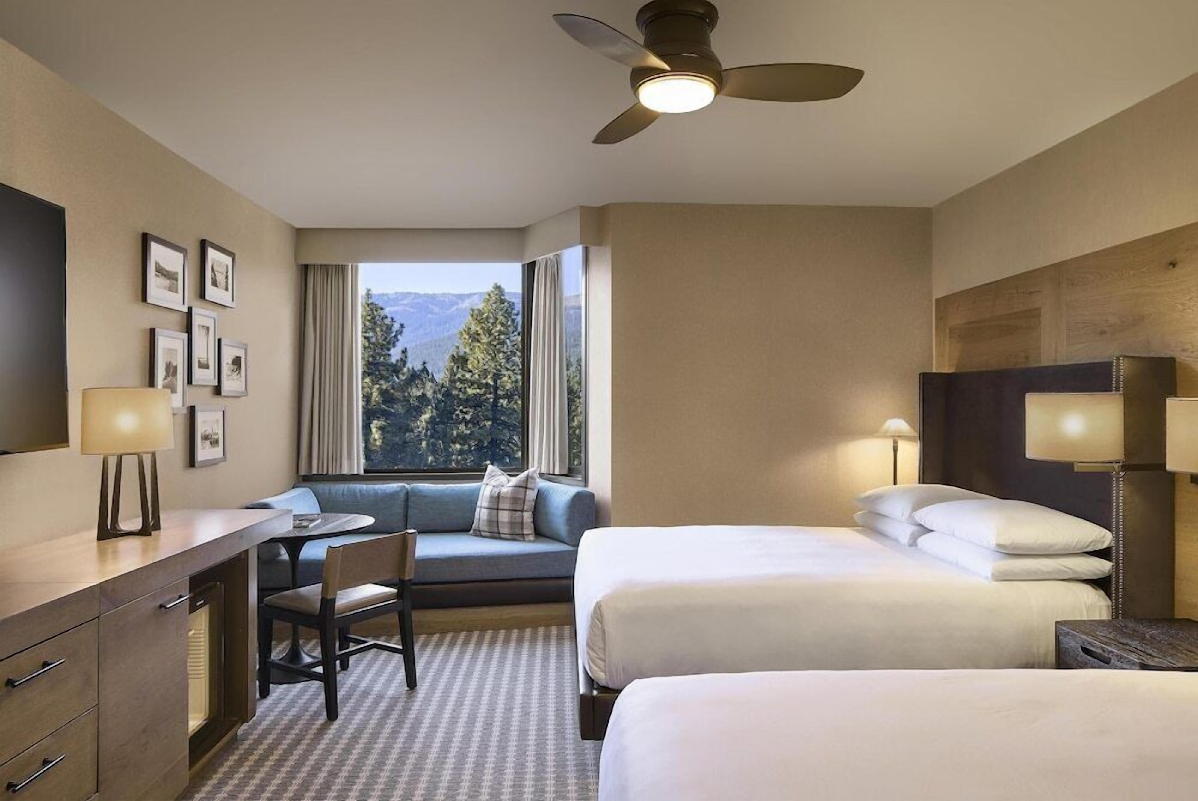 Down comforters, pillowtop beds, in-room safe, desk