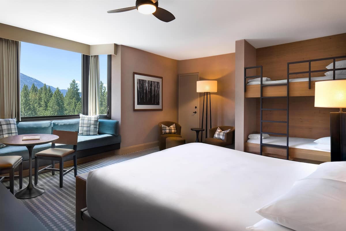 Down duvets, pillow-top beds, in-room safe, desk