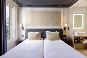 Premium bedding, in-room safe, desk, soundproofing