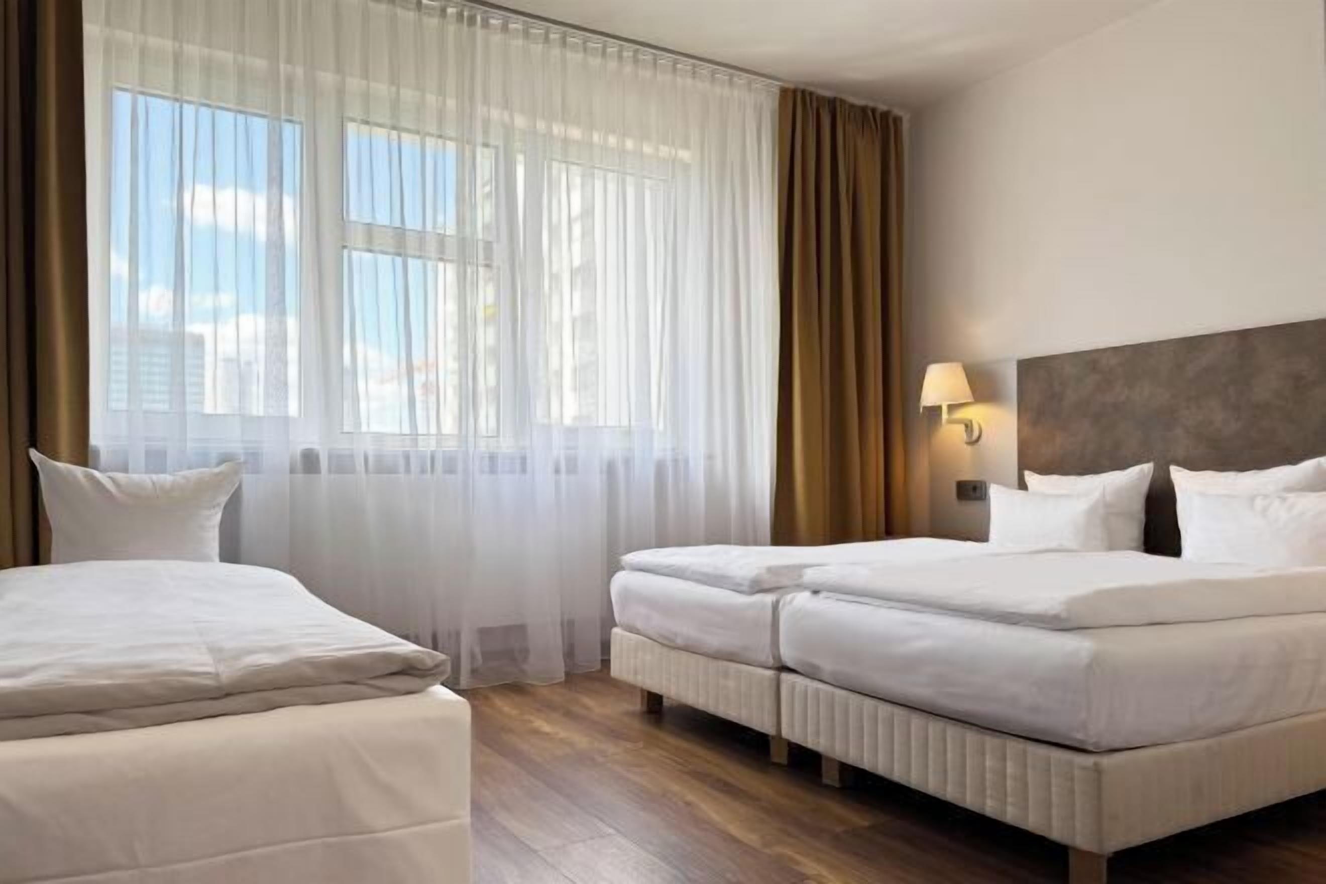 Hypo-allergenic bedding, blackout drapes, soundproofing, free WiFi