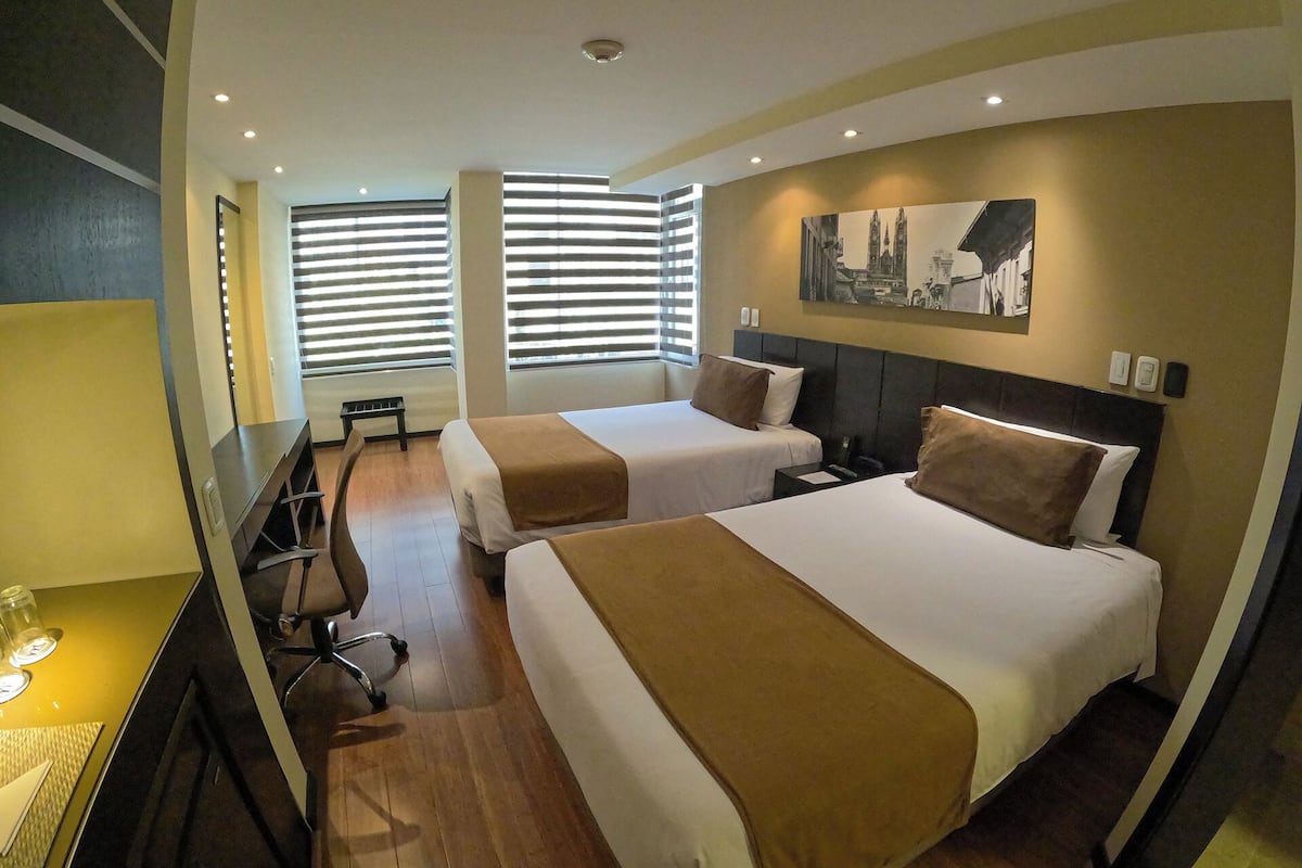 Deluxe Room, 2 Twin Beds | Pillowtop beds, in-room safe, laptop workspace, blackout drapes