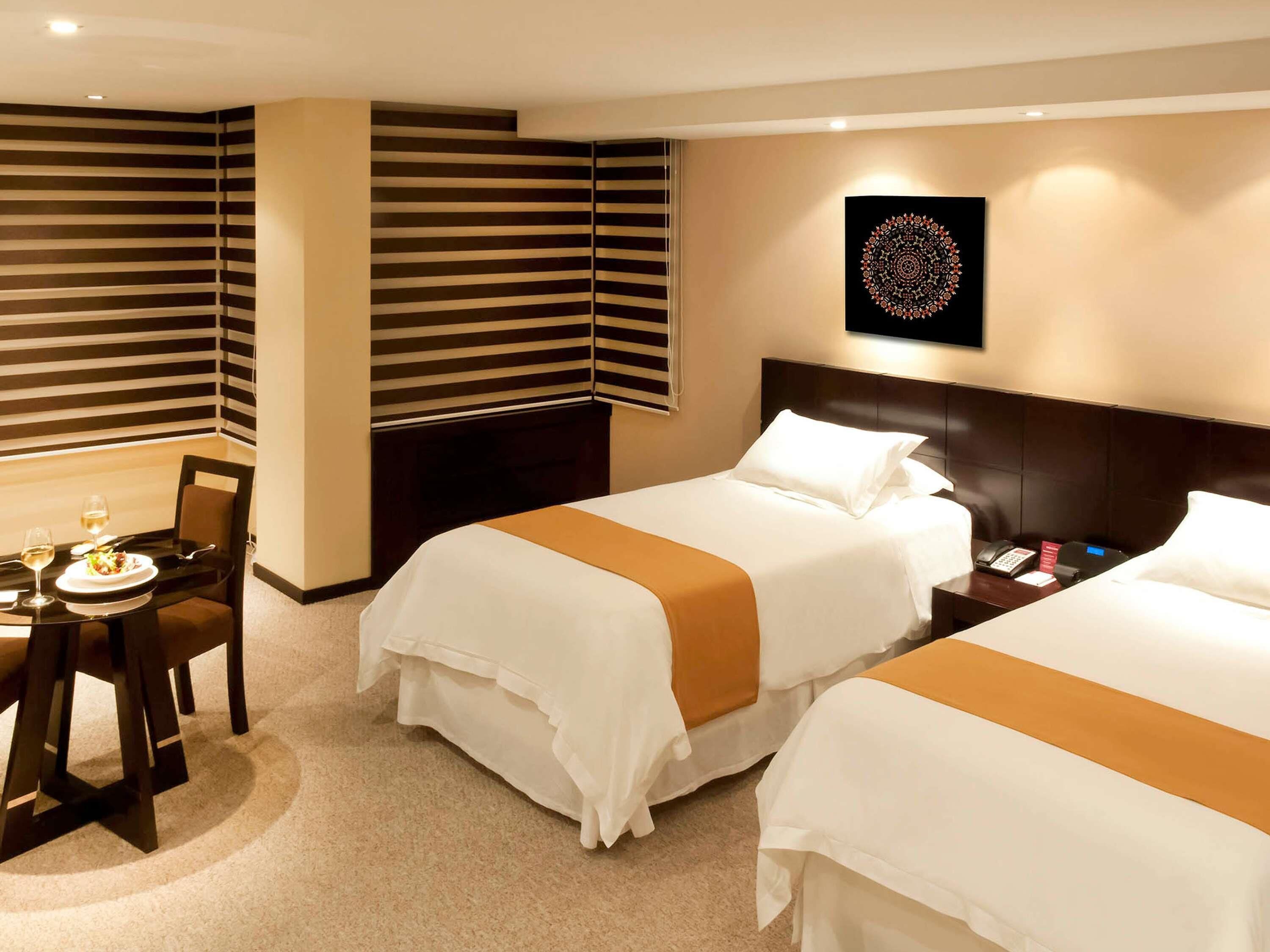 pillow-top beds, in-room safe, laptop workspace, blackout curtains