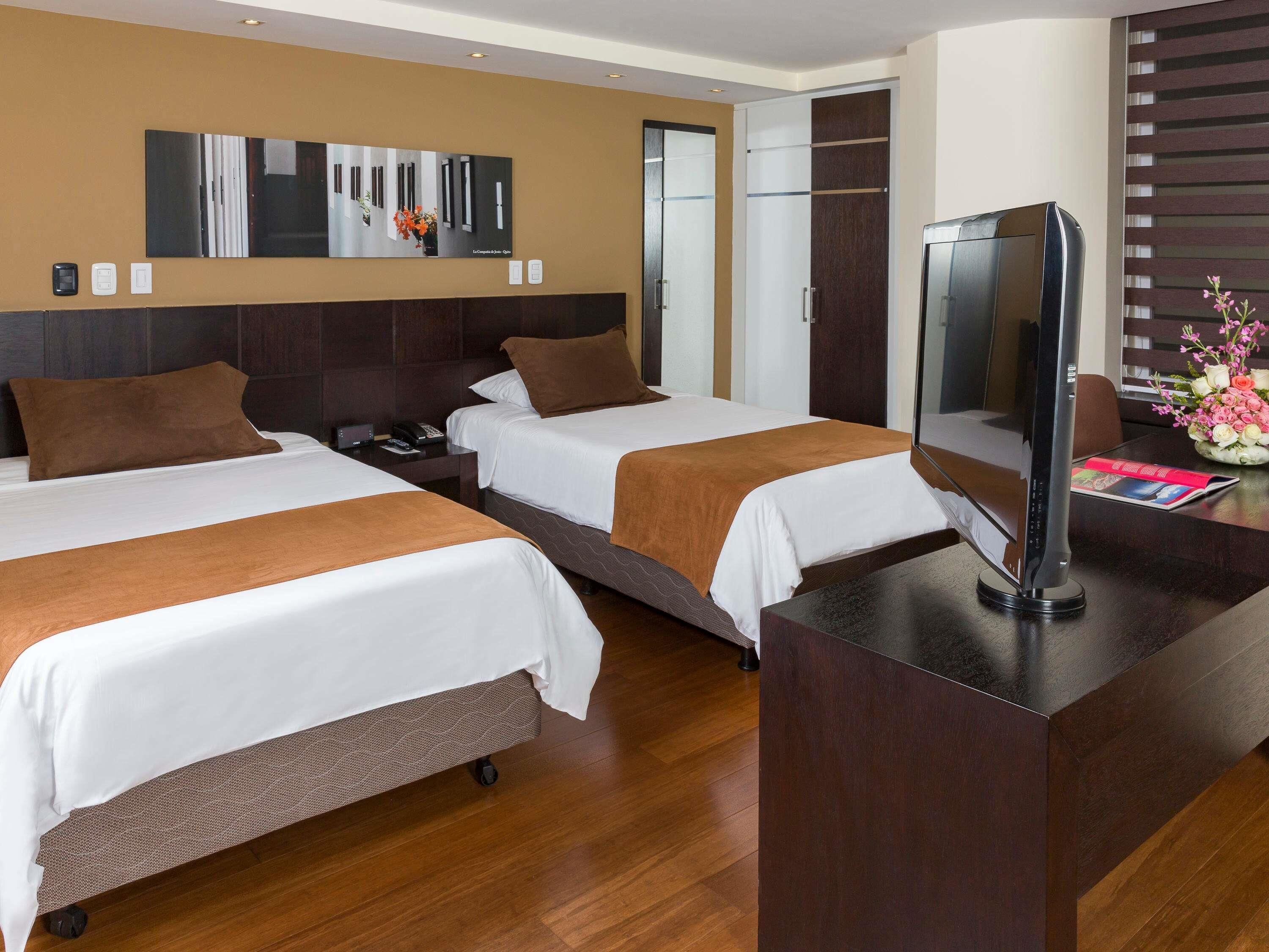 Deluxe Room, 2 Twin Beds | Pillowtop beds, in-room safe, laptop workspace, blackout drapes