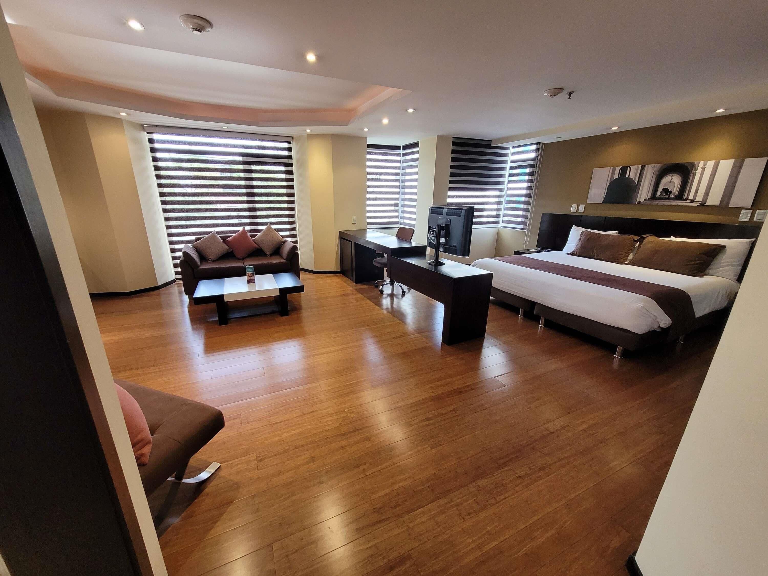 deluxe suite, 1 king bed | pillow-top beds, in-room safe, laptop workspace, blackout curtains