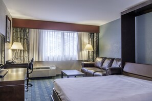 Deluxe Room, 1 King Bed | In-room safe, desk, laptop workspace, iron/ironing board