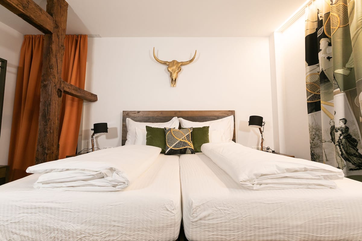 1 bedroom, hypo-allergenic bedding, down duvets, minibar
