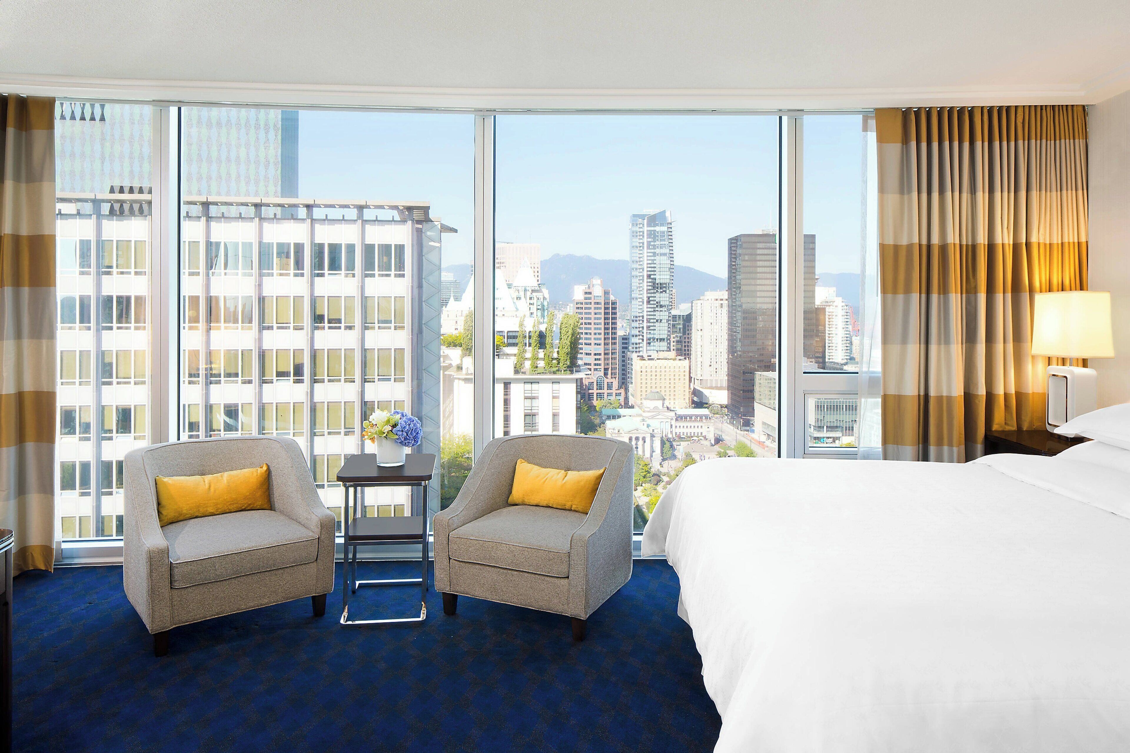 Premium bedding, down duvets, memory-foam beds, in-room safe