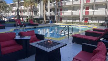 Outdoor pool, pool umbrellas, pool loungers