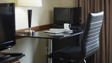 Premium bedding, pillowtop beds, desk, laptop workspace