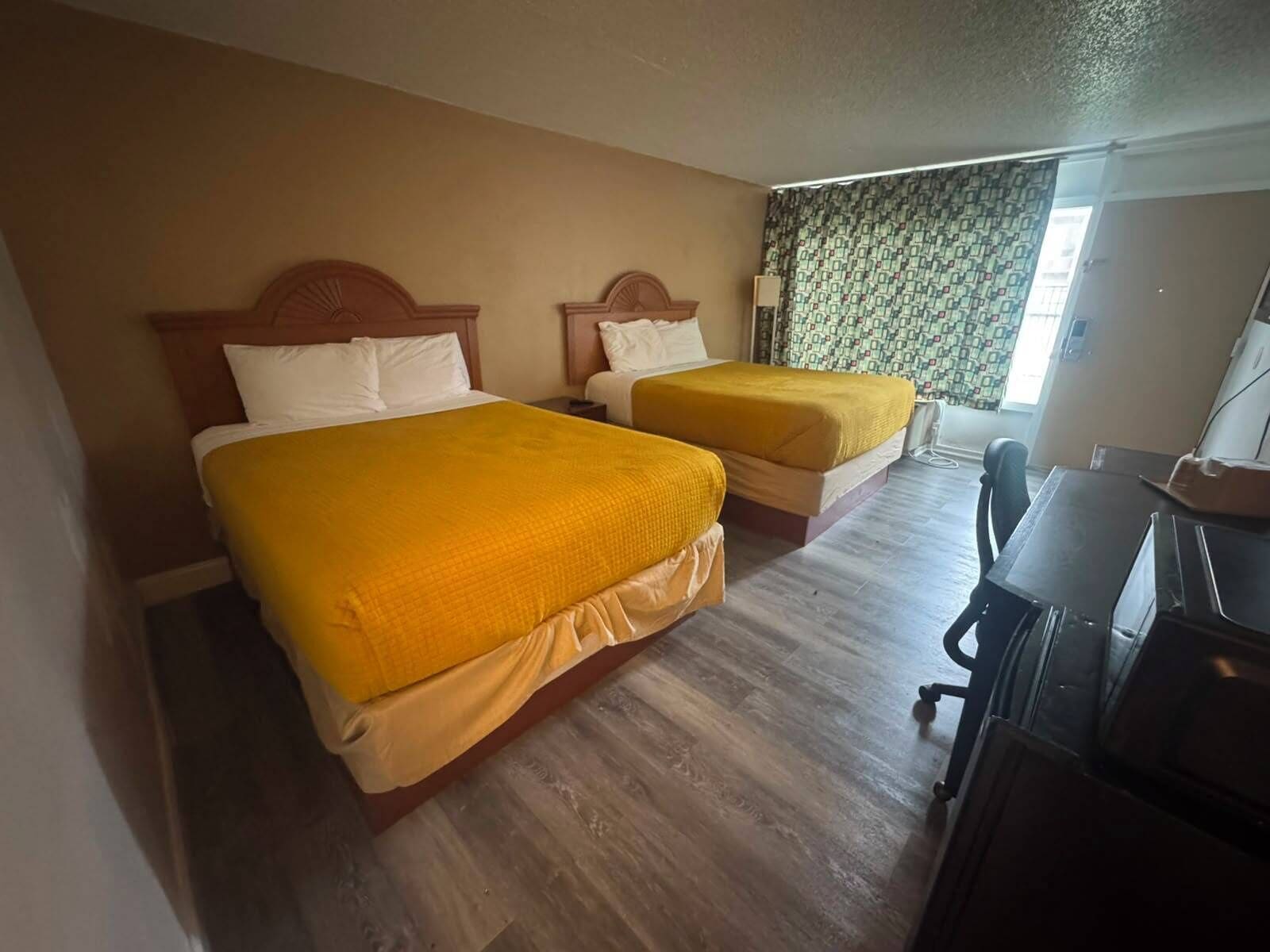 Premium bedding, down comforters, in-room safe, desk