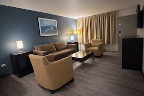 Phòng đơn Executive | Bộ đồ giường cao cấp, chăn bông, bàn, màn/rèm cản sáng