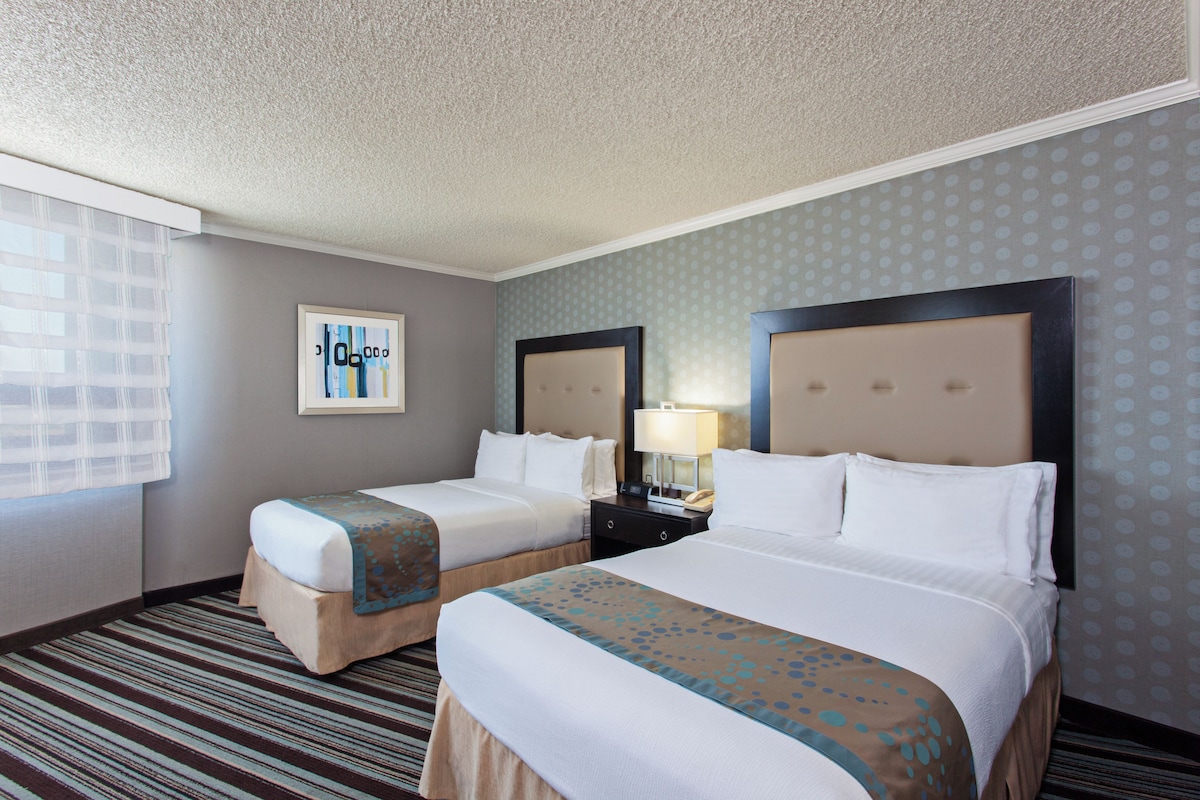 Standard Room, 2 Double Beds | In-room safe, desk, laptop workspace, blackout drapes