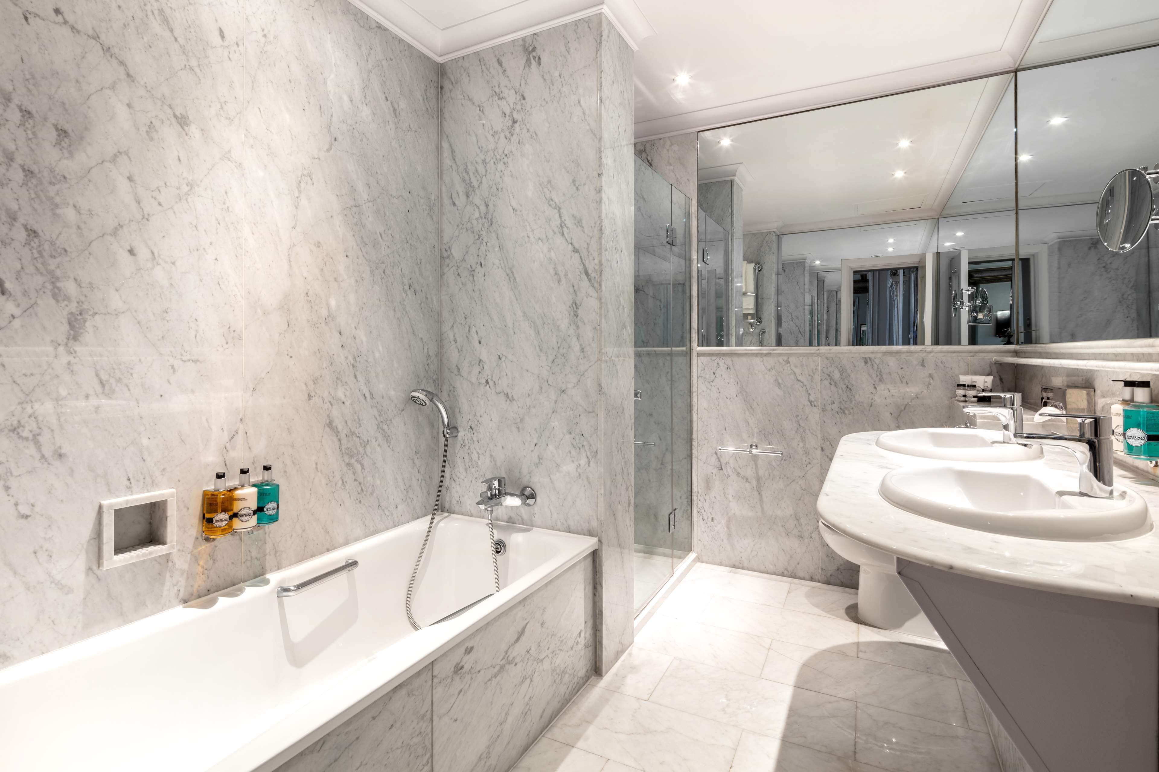 junior suite | bathroom | designer toiletries, hair dryer, towels