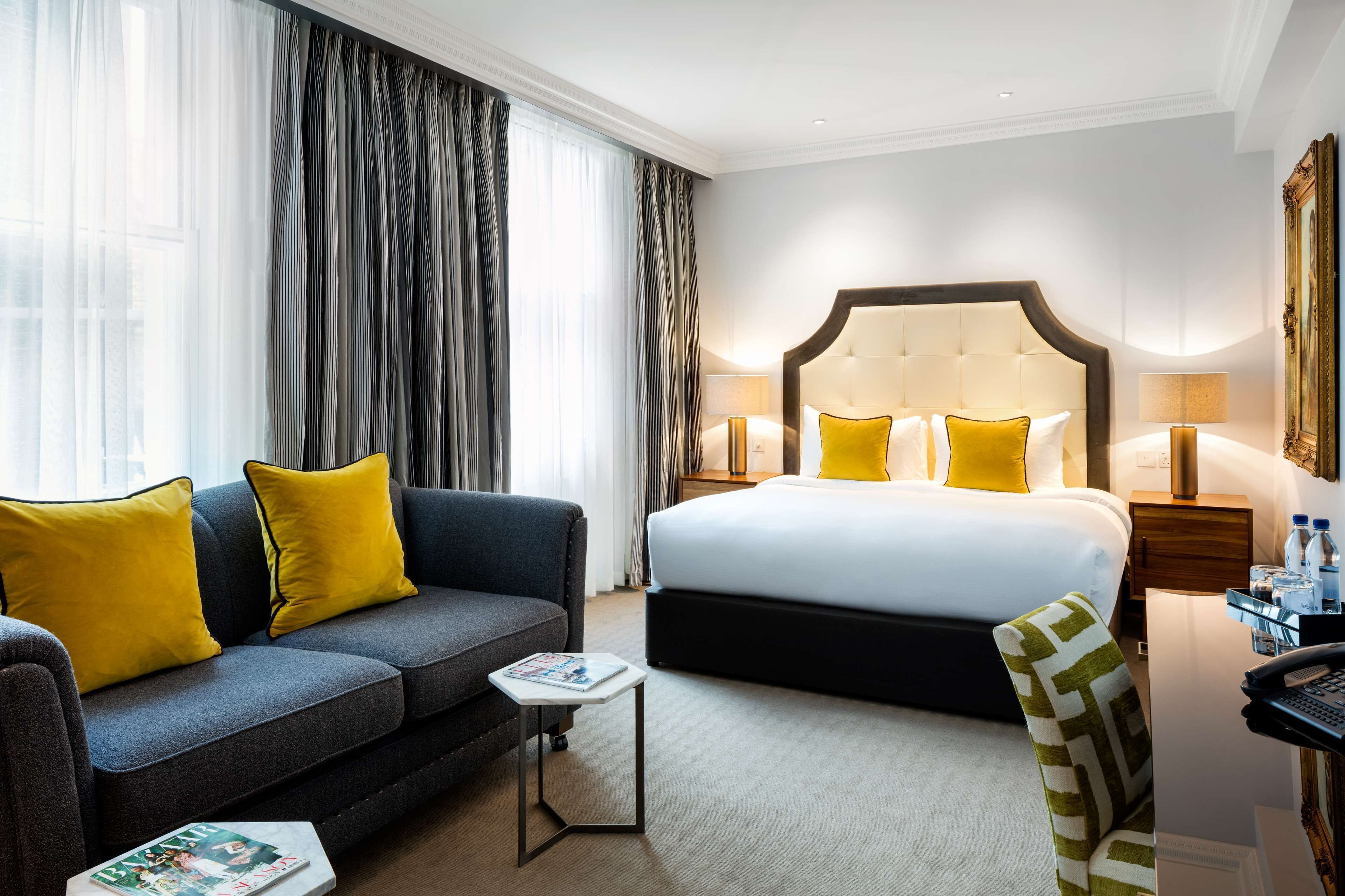 deluxe room | egyptian cotton sheets, premium bedding, in-room safe, desk