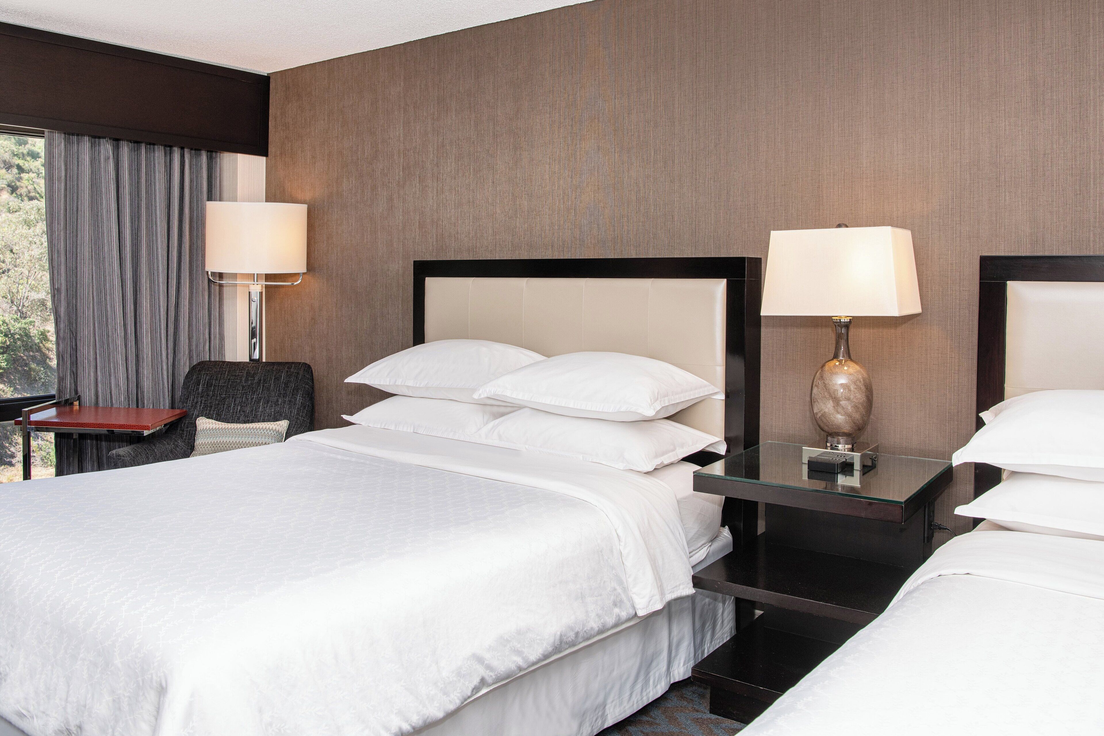 premium bedding, down duvets, pillow-top beds, in-room safe