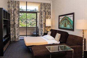 Premium bedding, down comforters, pillowtop beds, in-room safe