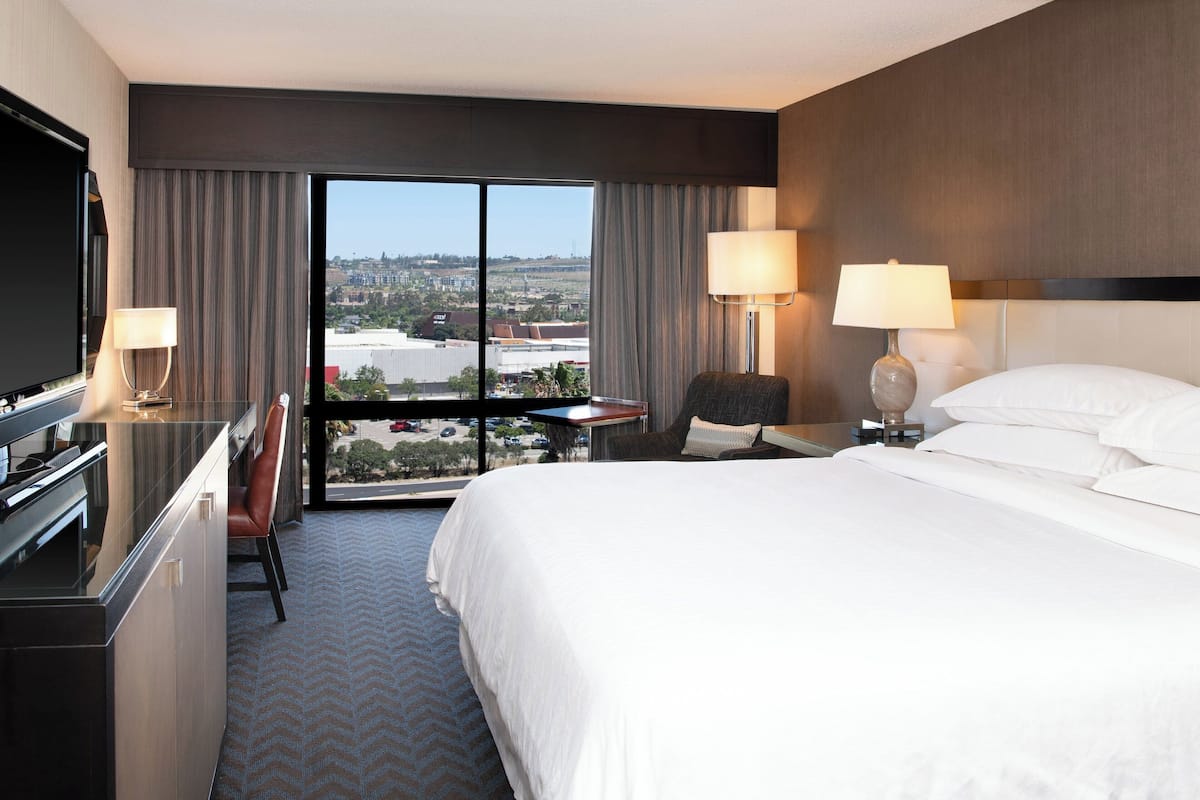 Premium bedding, down comforters, pillowtop beds, in-room safe