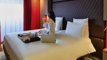 Ropa de cama de alta calidad y minibar