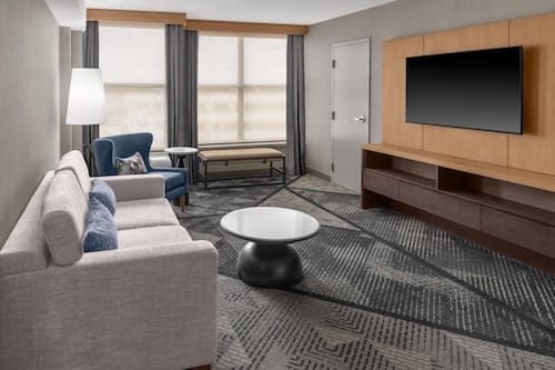 Suite, 1 King Bed (View) | Living area | 32-inch LCD TV with cable channels, TV