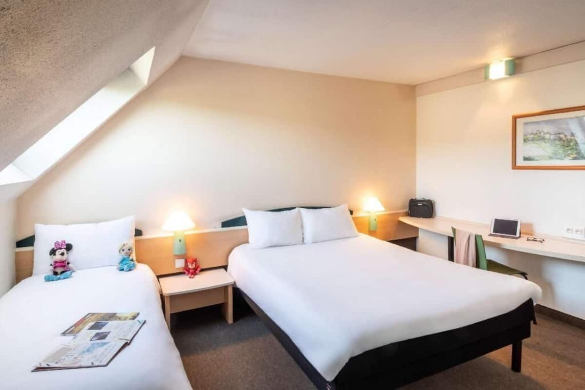 Premium bedding, pillowtop beds, desk, blackout drapes