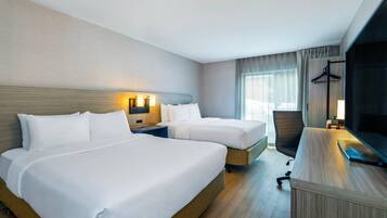 Premium bedding, pillowtop beds, desk, blackout drapes