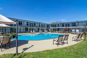 Outdoor pool, pool umbrellas, sun loungers