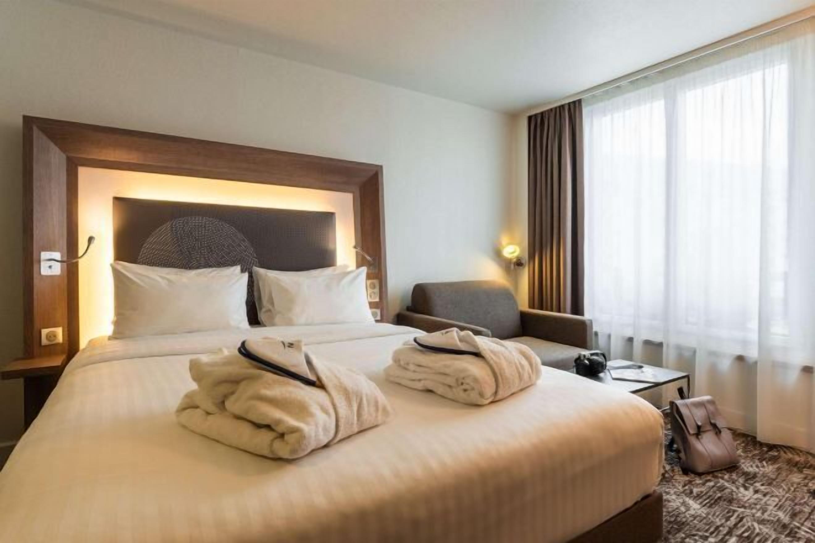 Premium bedding, pillowtop beds, minibar, in-room safe