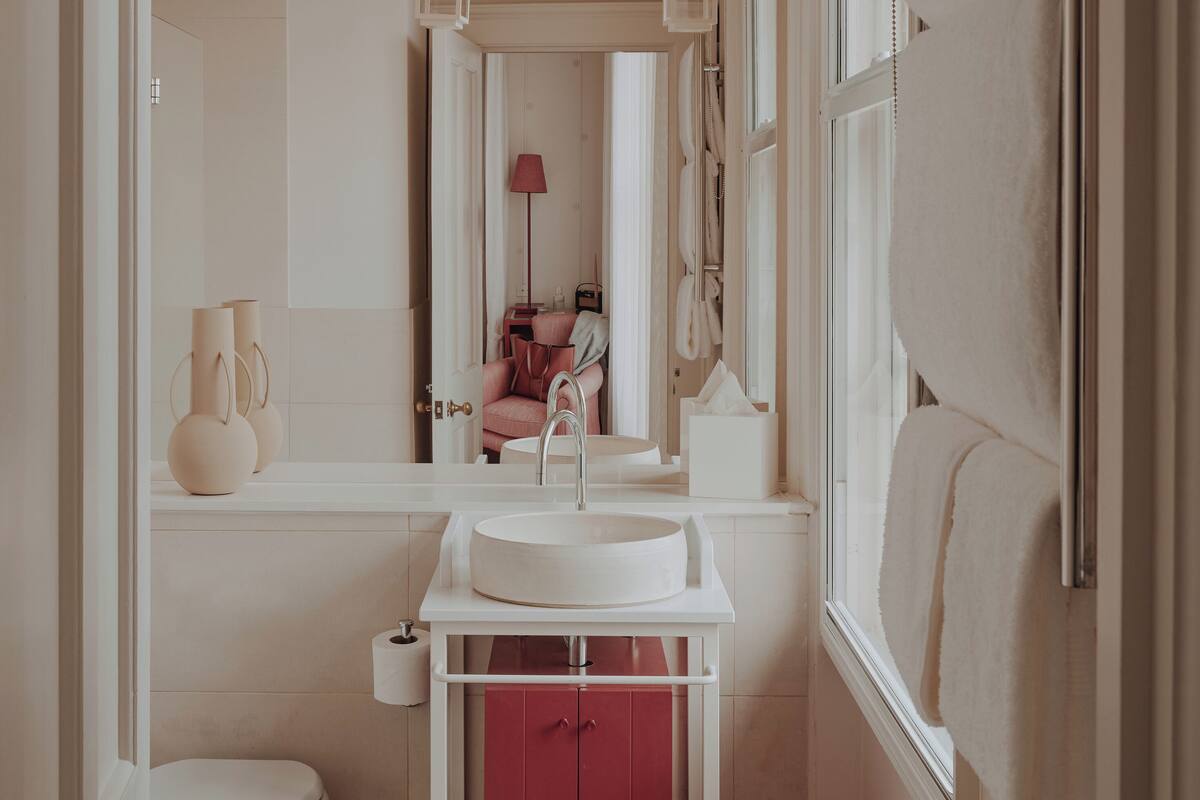 room (guest room) | bathroom | designer toiletries, hair dryer, bathrobes, slippers