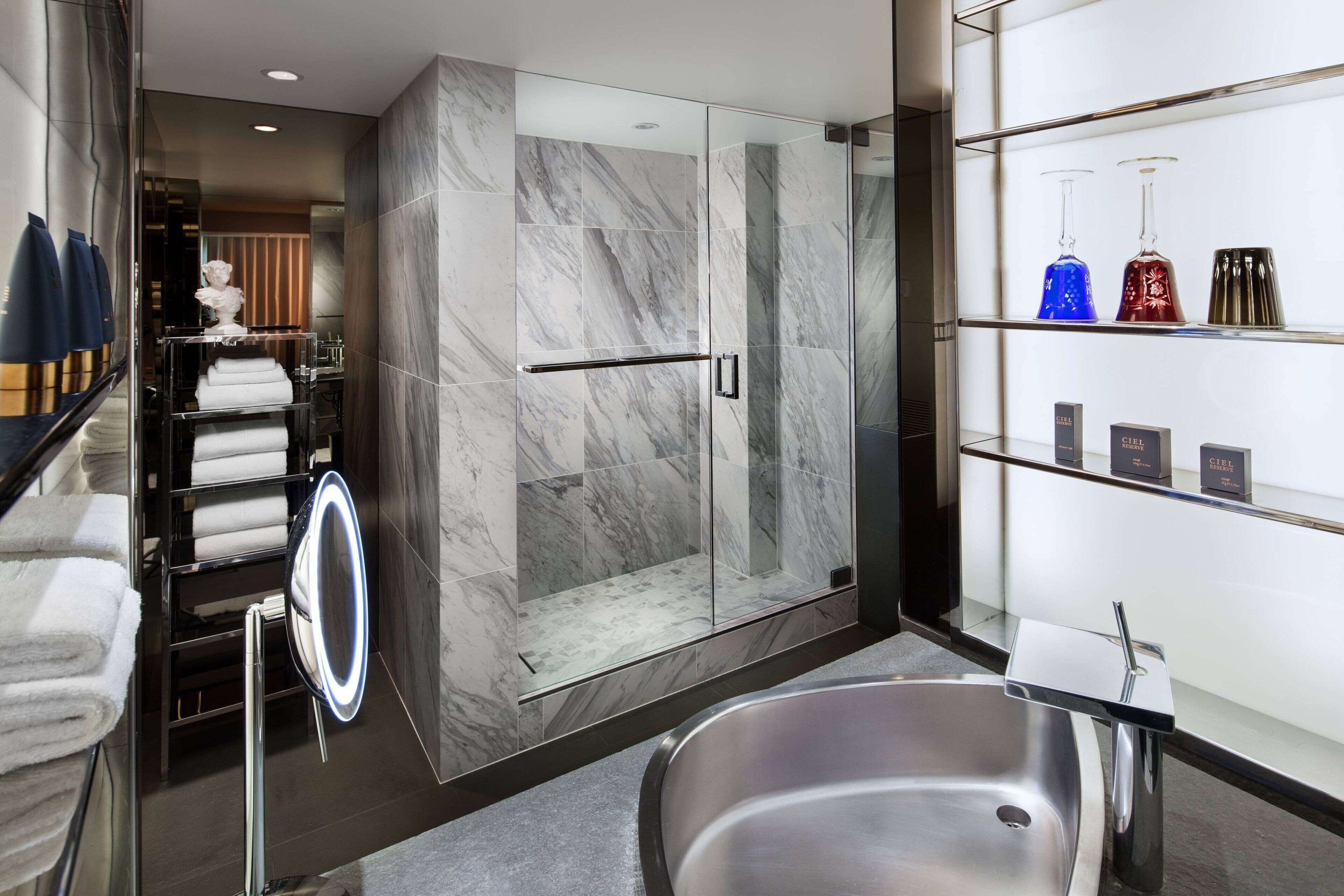 Designer toiletries, hair dryer, bathrobes, slippers