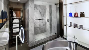 Designer toiletries, hair dryer, bathrobes, slippers