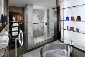 Designer toiletries, hair dryer, bathrobes, slippers