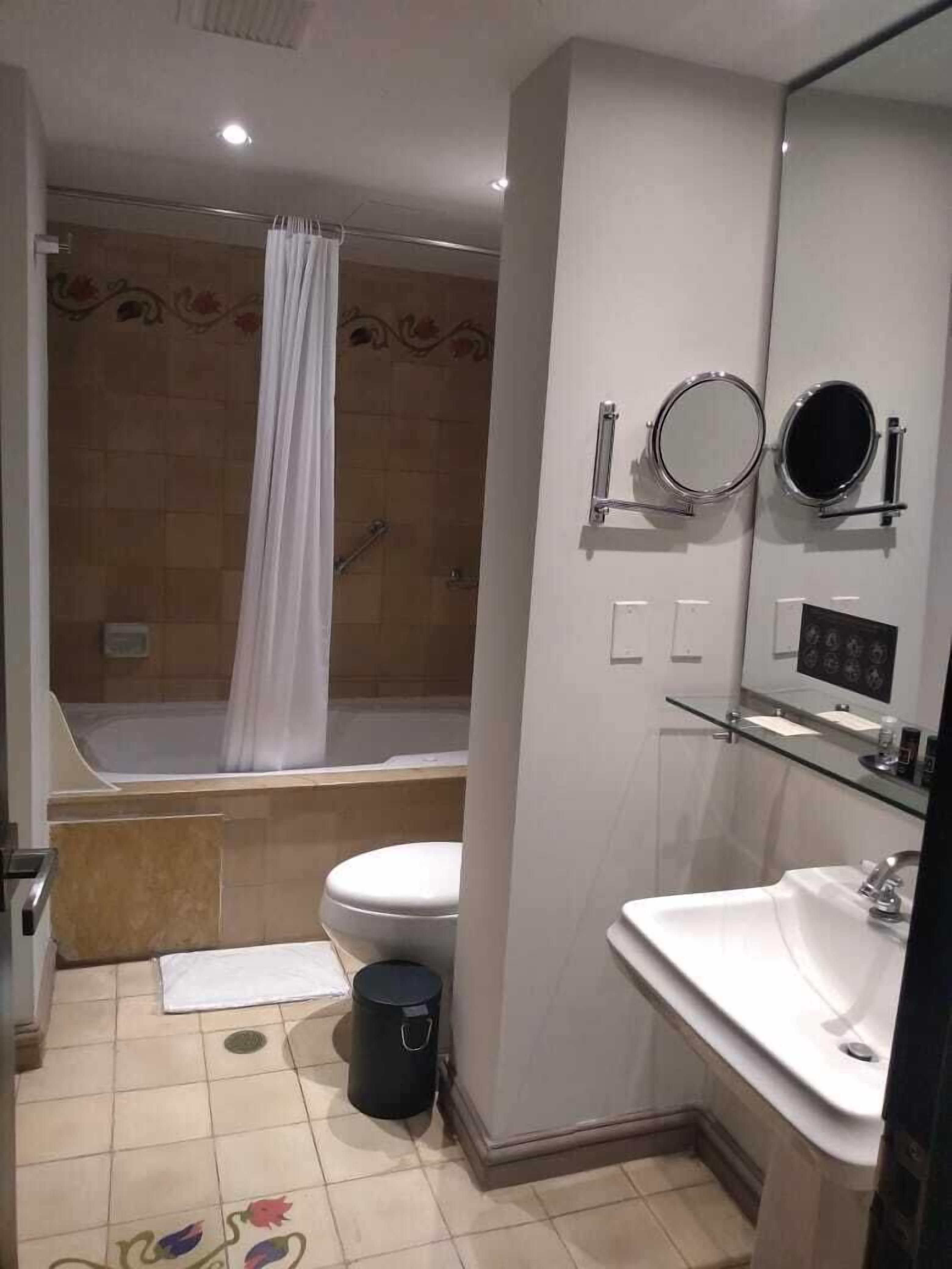 economy room | bathroom | shower, rainfall showerhead, free toiletries, hair dryer