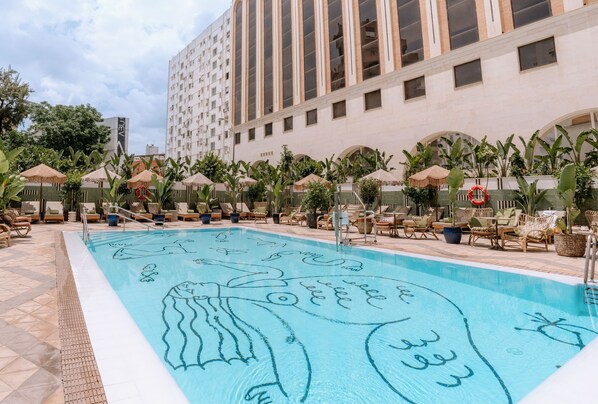 Outdoor pool, open 10:00 AM to 9:00 PM, pool umbrellas, pool loungers