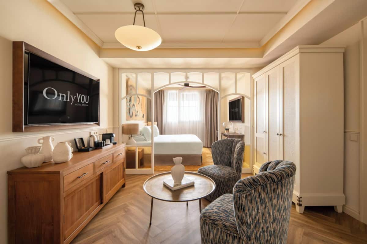 Luxe beddengoed, een minibar, een kluis op de kamer, een bureau