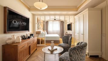 Ropa de cama de alta calidad, minibar, caja fuerte y escritorio