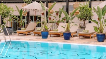Outdoor pool, open 10:00 AM to 9:00 PM, pool umbrellas, sun loungers