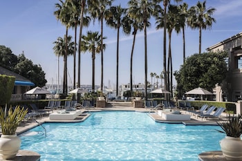 Outdoor pool, cabanas (surcharge), pool umbrellas at The Ritz-Carlton, Marina del Rey