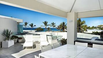 Enjoy ocean views and comfortable seating in our shaded patio area.